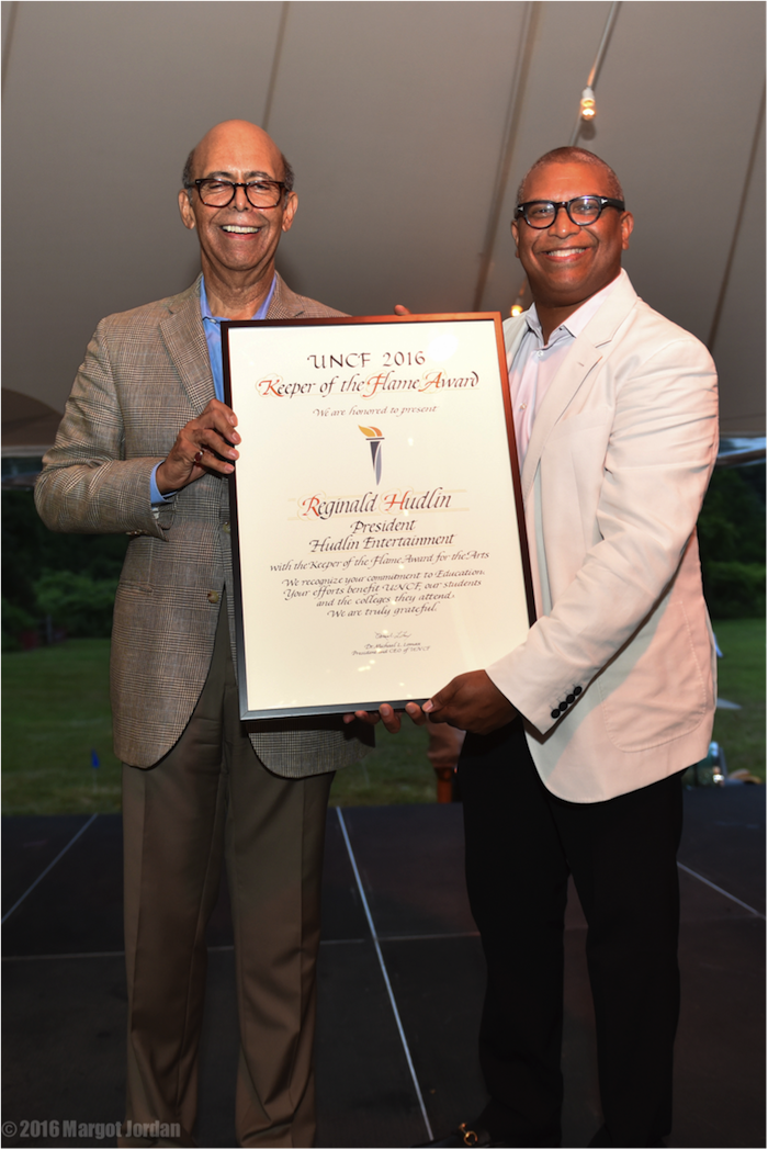 Dr. Michael Lomax, President of the UNCF, presents me with a huge plaque!